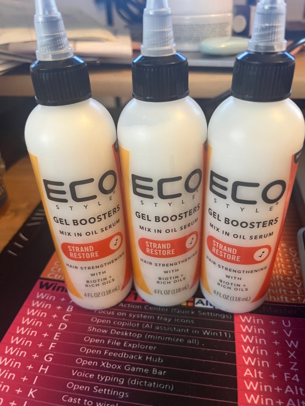 Gel Boosters Strand Restore Mix-In Oil Serum — White with Orange Accents